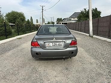 аудио усилитель: Mitsubishi Lancer: 2006 г., 1.6 л, Механика, Бензин, Седан — 7