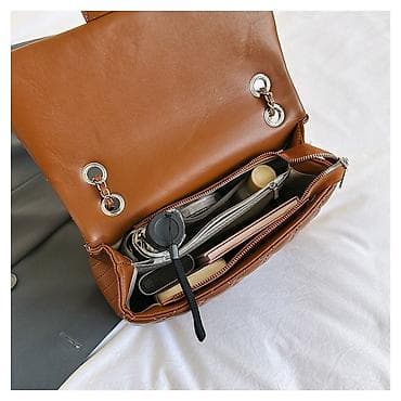 Классические сумки: Классическая стеганая сумка с цепочкой
 
Цена:1500 сом — 5