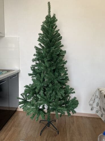 искуственные листья: Искусственная ёлка на металлической подставке. - Высота 180см - — 1
