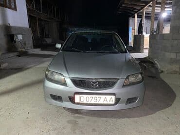Водный транспорт: Mazda 323: 2002 г., 1.6 л, Механика, Бензин, Универсал — 5