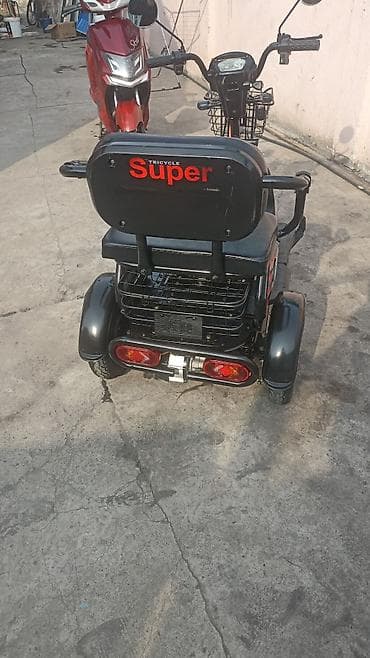 электрокар взрослый: Электрический трёхколёсный скутер (трицикл) с двумя рядами сидений. 48 — 2