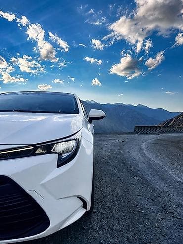 byd e2 2019: Toyota Corolla: 2023 г., 1.8 л, Вариатор, Гибрид, Седан — 7