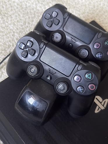 пле: Игровая консоль PlayStation 4 Pro (черная) с аксессуарами — 1