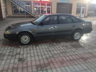 опель вектора с: Mazda 626: 1992 г., Ручные, Седан — 9