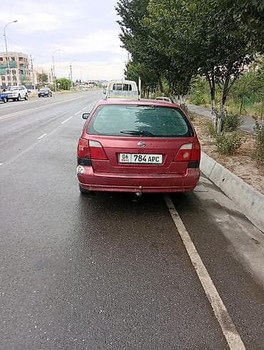 red cell: Nissan Primera: 2000 г., 2 л, Механика, Бензин, Универсал — 3