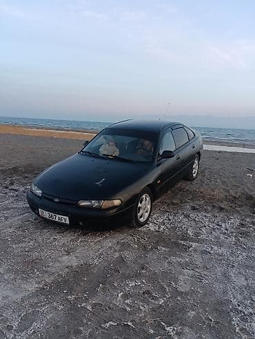 ml 163: Mazda 626: 1992 г., Седан — 6