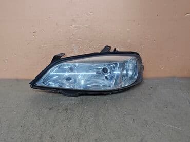 запчасти на опель зафира б: Передняя левая фара Opel 1999 г., Б/у, Оригинал, Германия — 1