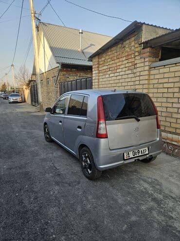 шипованные шины: Daihatsu Cuore: 2005 г., 1 л, Механика, Бензиновая, Хэтчбэк — 2