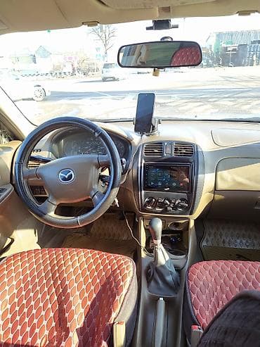 mazda 2: Mazda 323: 2000 г., 1.5 л, Механика, Бензин, Седан — 10