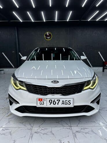 Ламинат: Kia optima 2019, 2.4 бензин Цвет белый жемчуг, полная панарама — 1