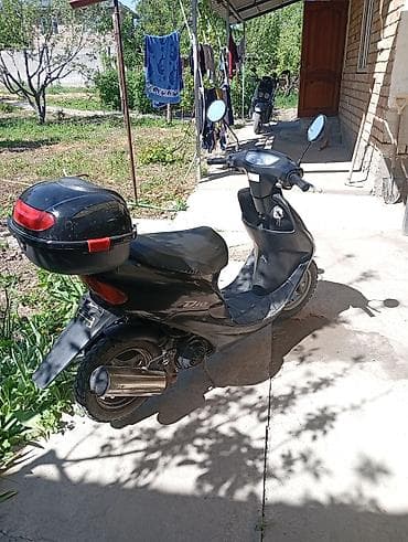 dio 27 af27: Скутер Honda Dio, черный цвет. Особенности и комплектация: - Легкий — 3