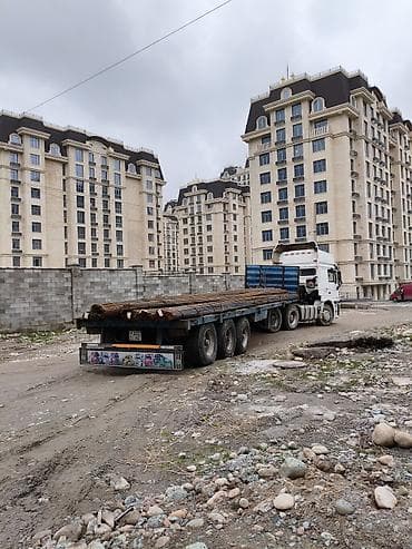 b class: Услуга грузоперевозок на авто‑транспортe дальнего следования. - — 5