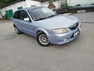 Mazda 323: 2003 г., 1.6 л, Механика, Бензин, Универсал