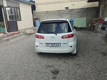 mini ev: Mazda Demio: 2006 г., 1.3 л, Автомат, Бензин, Хэтчбэк — 5
