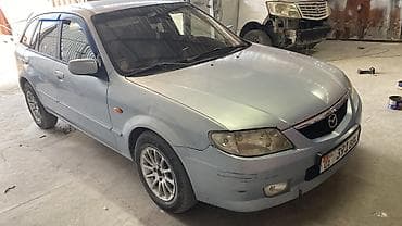 super cub: Mazda 323: 2002 г., 1.6 л, Механика, Бензин, Универсал — 1