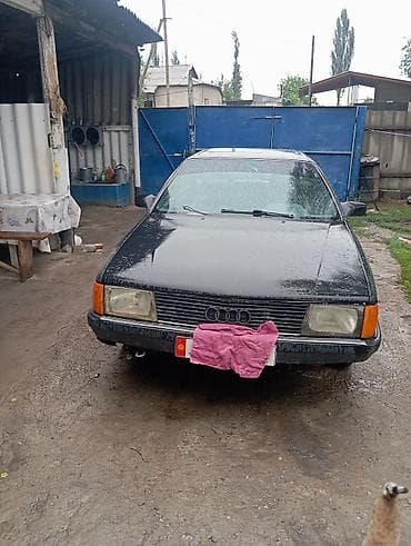 супорт 210: Audi 100: 1984 г., 1.8 л, Кол менен иштөөчү, Бензин, Седан — 1