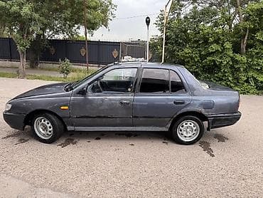 морнинг диска: Nissan Sunny: 1993 г., 1.6 л, Механика, Бензин, Седан — 5