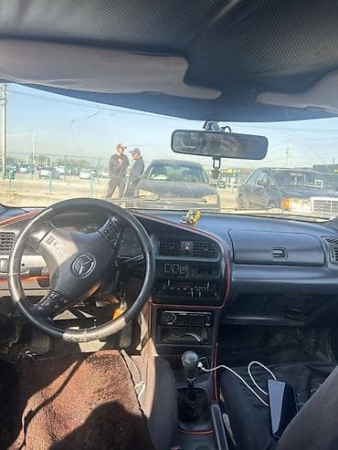 step 2: Mazda 323: 1994 г., Ручные, Седан — 4