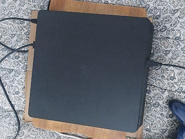 ufc ps5: Игровая приставка Sony PlayStation 4 Slim (черная) с комплектом — 1