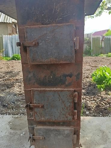 Металлическая печь-буржуйка/котёл твердотопливный самоварного типа