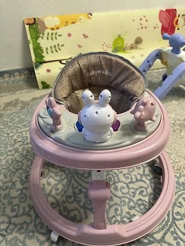 как новый: Детские ходунки Babywalker, розовые. - Круглая устойчивая база на — 1