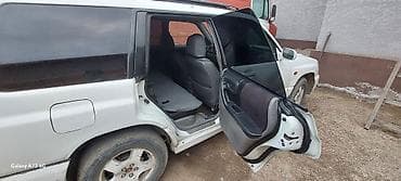 споллер: Subaru Forester: 2001 г., 2 л, Автомат, Газ, Универсал — 3