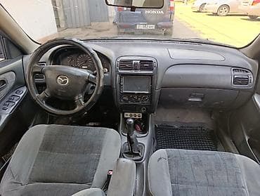 mazda 7: Mazda Capella: 1999 г., 1.8 л, Механика, Универсал — 5