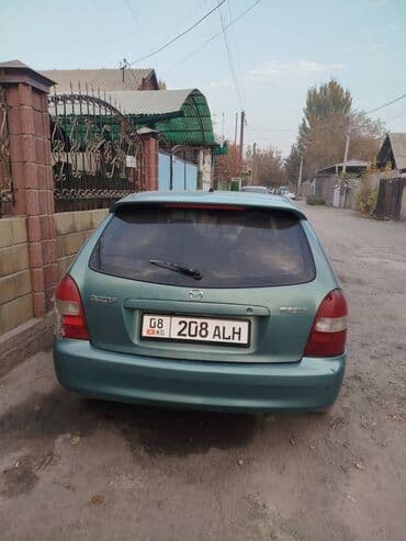 mazda 323 ф: Mazda 323: 2002 г., 1.6 л, Механика, Бензин, Хетчбек — 1