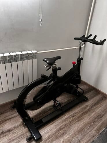 срочно продаю в связи с переездом: Профессиональный спин-байк (велотренажёр) для тренировок дома или в — 1