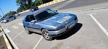 е 211: Mazda 323: 1994 г., 1.6 л, Ручные, Бензин, Хэтчбэк — 4