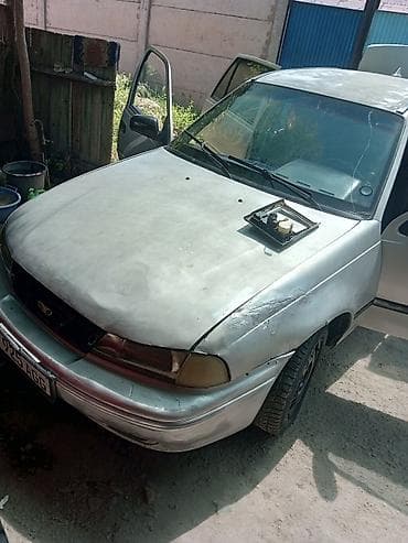 215 65 16c: Daewoo Nexia: 1997 г., 1.5 л, Механика, Бензин, Седан — 1