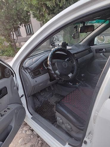 юто ош: Daewoo Gentra: 2013 г., 1.5 л, Механика, Бензин, Седан — 8