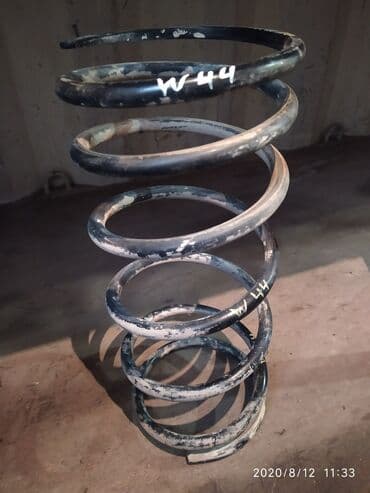 Mitsubishi Pajero W44 Пружина амортизатора, Митцубиси Паджеро В44