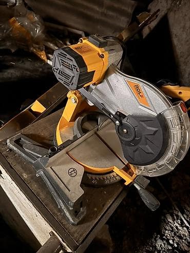 Торцовочная пила ROLF (модель на шильдике: ROLF T0?-3?5A — надпись