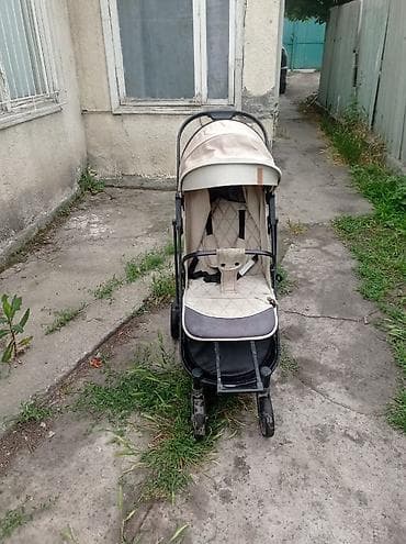 каляска даром: Отдам за 3л масла прогулочную коляску-трость/компактная коляска — 1