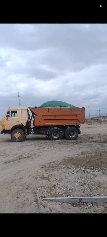 Самосвал для перевозки сыпучих материалов услуги доставка .песок