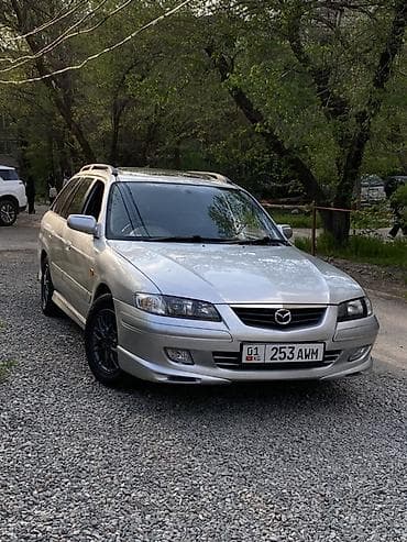 бмв капля: Mazda Capella: 2000 г., Универсал — 1