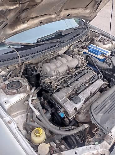 Унаа сатуу: Mazda Familia: 2002 г., 1.6 л, Кол менен иштөөчү, Бензин, Универсал — 7