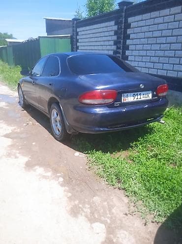 Mazda MX-6: 1994 г., 1.6 л, Механика, Бензин, Седан