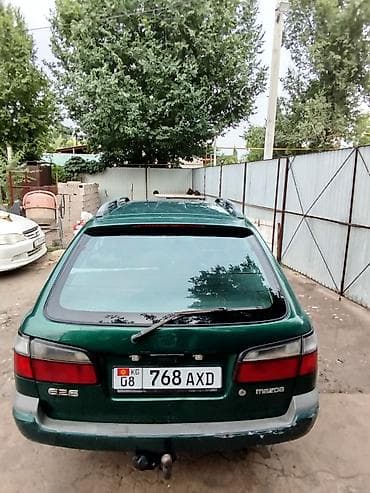 Унаа: Mazda 626: 1998 г., 1.8 л, Кол менен иштөөчү, Бензин, Универсал — 4
