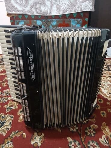 шлемы мото: Акордеон Weltmeister (кнопочно-клавишный) Описание: - Полноразмерный — 4