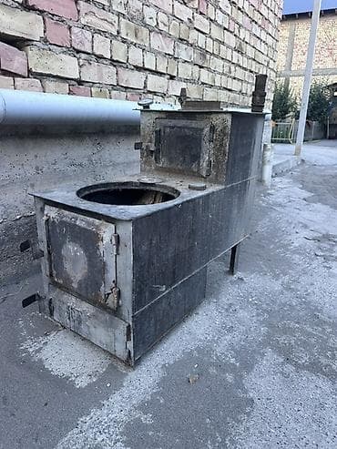 деревянный бачок: Твердотопливная печь-«буржуйка» с варочной поверхностью и водяным — 1