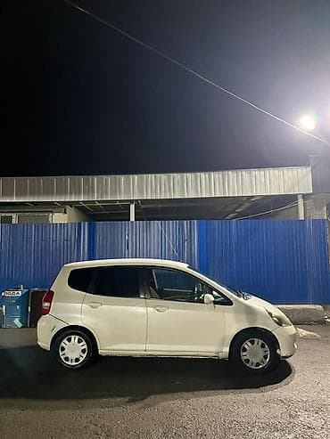 кia 7: Honda Fit: 2001 г., Автомат, Бензин, Хэтчбэк — 2