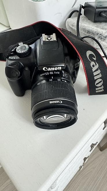 sony bravia: Зеркальный фотоаппарат Canon EOS 1100D с комплектным зум-объективом — 1