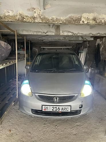 golf 2: Honda Fit: 2001 г., 1.3 л, Вариатор, Бензин, Хэтчбэк — 6