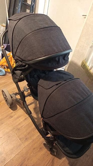 Детская коляска для двоих (тандем, сиденья друг за другом)