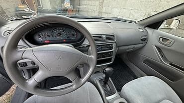 митсубиси спейк стар: Mitsubishi Galant: 2001 г., Седан — 7