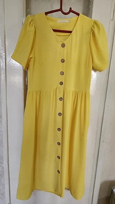 Женское платье миди лимонно‑жёлтого цвета. - Свободный А‑силуэт с