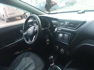 кызыл октябрь: Kia Rio: 2013 г., 1.4 л, Механика, Бензин, Седан — 3
