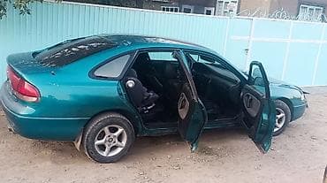 авто насос: Mazda 626: 1996 г., 1.8 л, Механика, Бензин, Лифтбек — 2